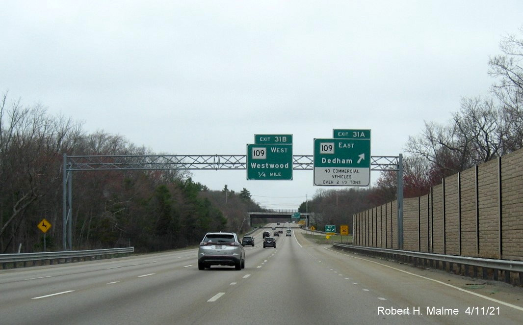 Image of overhead signs at ramp for MA 109 East exit with new milepost based exit numbers on I-95/MA 128 North in Dedham, April 2021