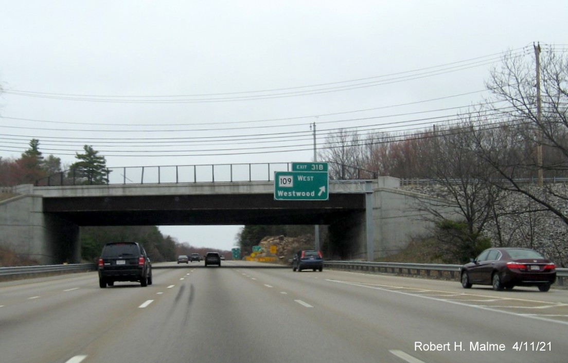 Image of overhead sign at ramp for MA 109 West exit with new milepost based exit number on I-95/MA 128 North in Dedham, April 2021
