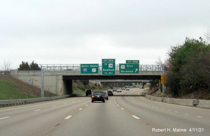 Image of overhead signage at ramp for US 1 South exit with new milepost based exit number on I-95/MA 128 South in Dedham, April 2021