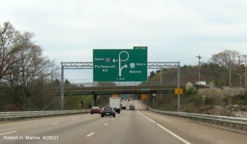 Image of 1 mile advance diagrammatic sign for I-93 North exit with new milepost based exit number and yellow Old Exit 12 advisory sign on right support on I-95 North in Canton, April 2021