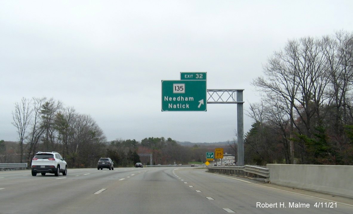 Image of overhead ramp sign for MA 135 exit with new milepost based exit number on I-95/MA 128 North in Dedham, April 2021