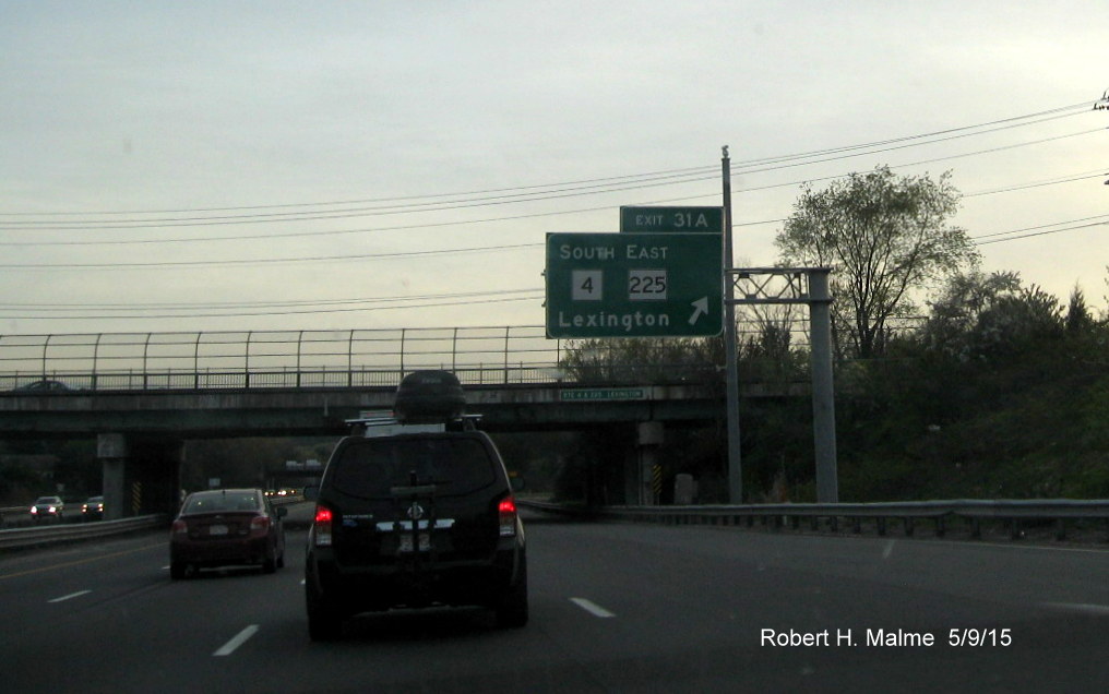 Image of overhead exit signage for MA 4 East/MA 225 South on I-95 South in Lexington