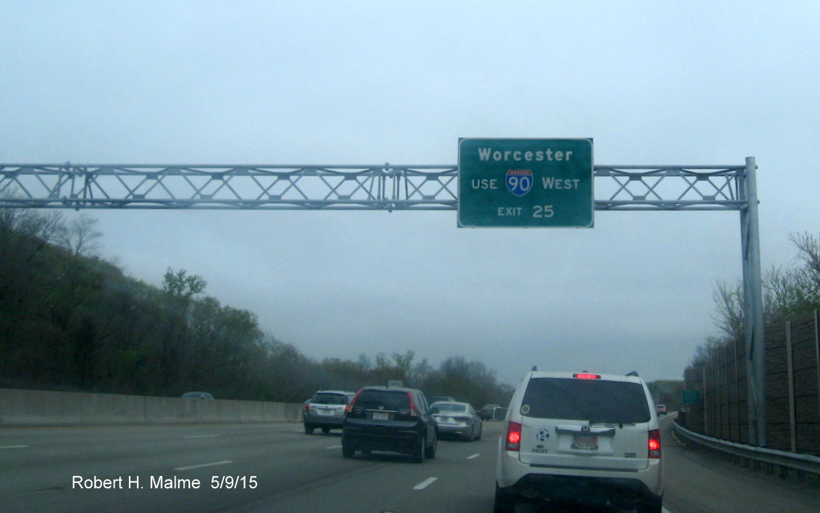 Image of overhead auxiliary sign for I-90/Mass Pike exit on I-95 North in Newton