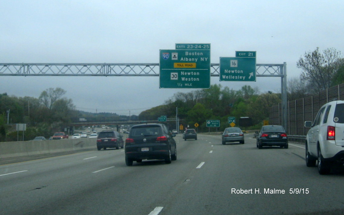 Image of overhead signs on ramp from I-95 North to Mass Pike/Ma 30 in Weston