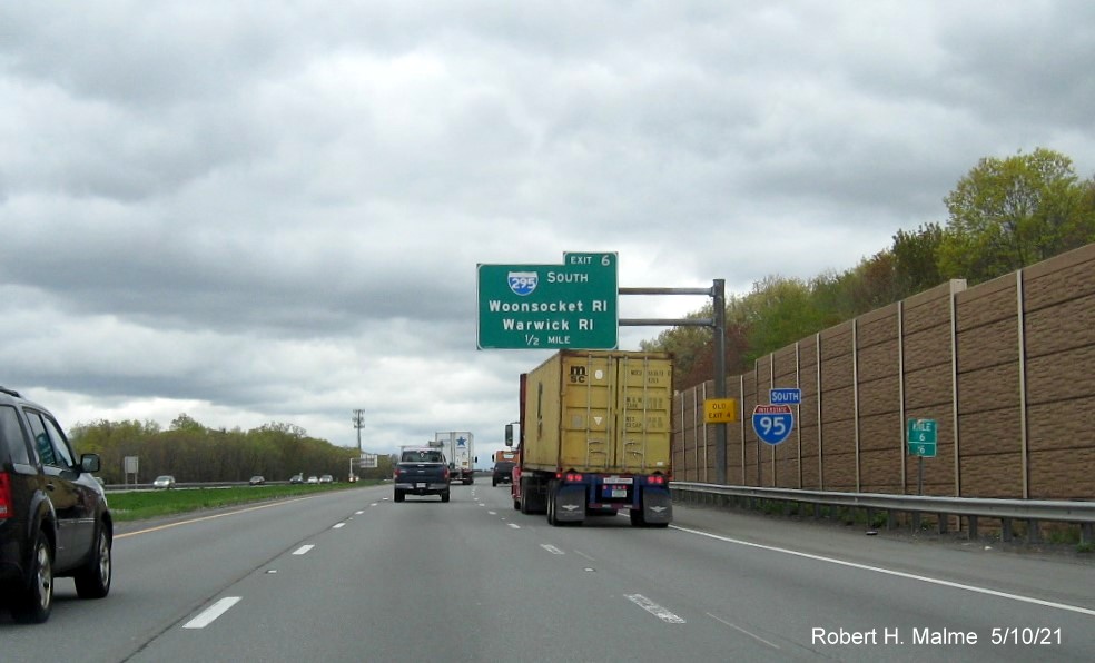 Image of 1/4 mile advance overhead sign for I-295 South exit with new milepost based exit number and yellow Old Exit 4 sign on support on I-95 South in Attleboro, May 2021