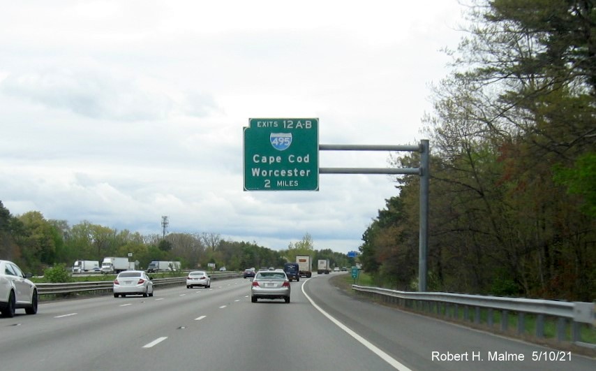 Image of 2 Miles advance overhead sign for I-495 exit with new milepost based exit number on I-95 North in Mansfield, May 2021