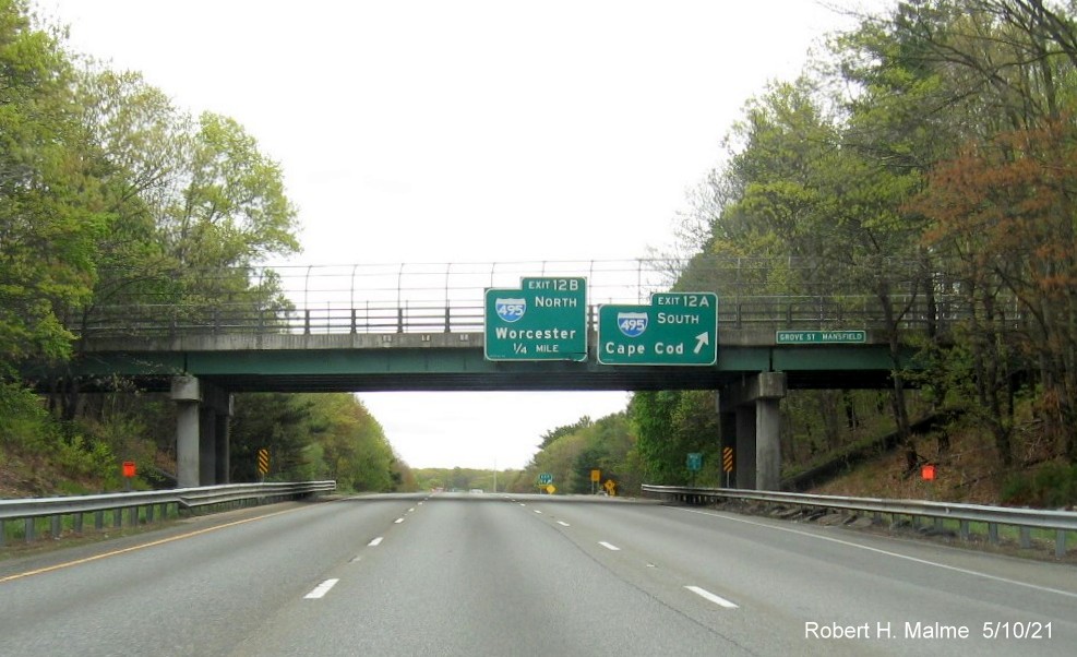 Image of overhead signage with new milepost based exit numbers at ramp for I-495 South exit on I-95 North in Mansfield, May 2021