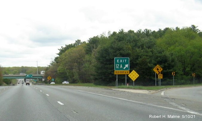 Image of gore sign for I-495 South exit with new milepost based exit number and yellow Old Exit 6A sign attached below on I-95 North in Mansfield, May 2021