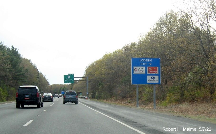 Image of recently placed blue lodging services sign for US 1 exit on I-95 South in Walpole, May 2022