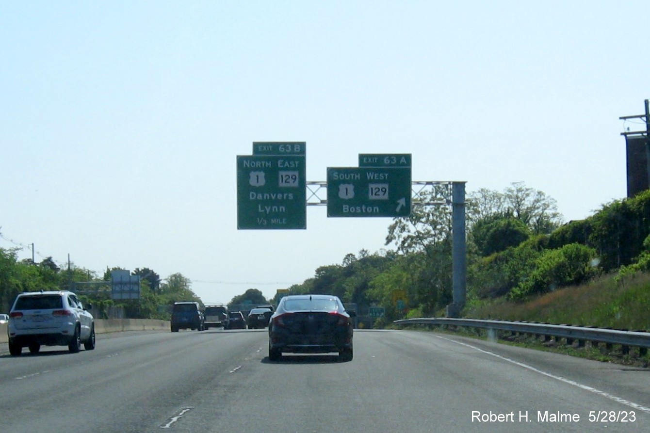 Image of recently placed overhead signs at ramp for the US 1 South MA 129 West exit on I-95/MA 128 North in Lynnfield, May 2023