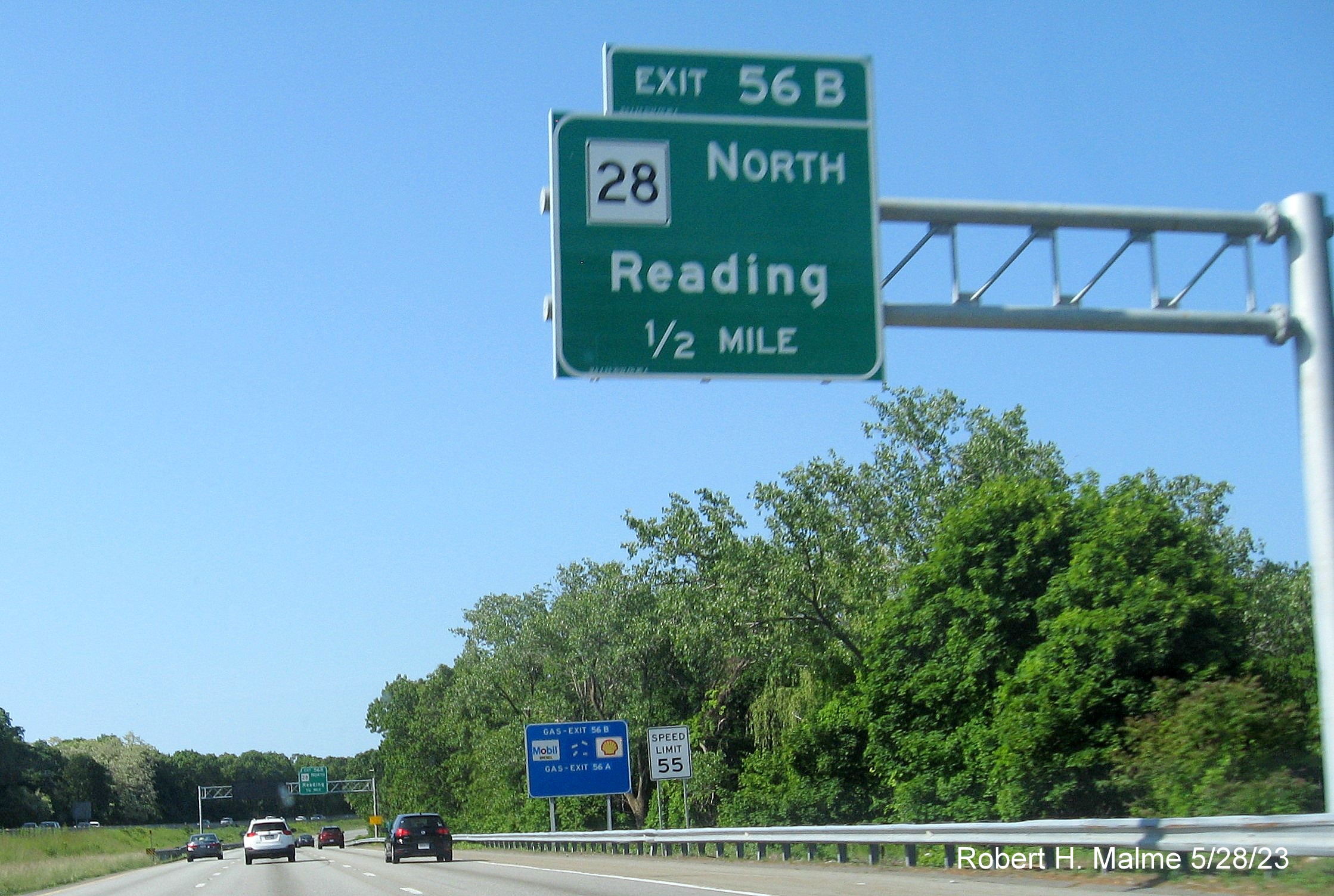 Image of recently placed 1/2 mile advance overhead sign for MA 28 exit on I-95 South in Reading, May 2023