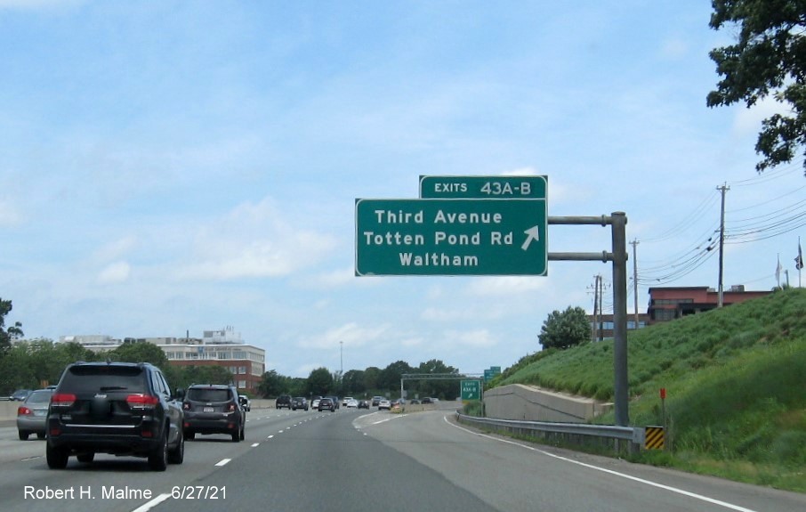 Image of overhead ramp sign for Third Avenue/Totten Pond Road exits with new milepost based exit numbers on I-95/MA 128 North in Waltham, June 2021