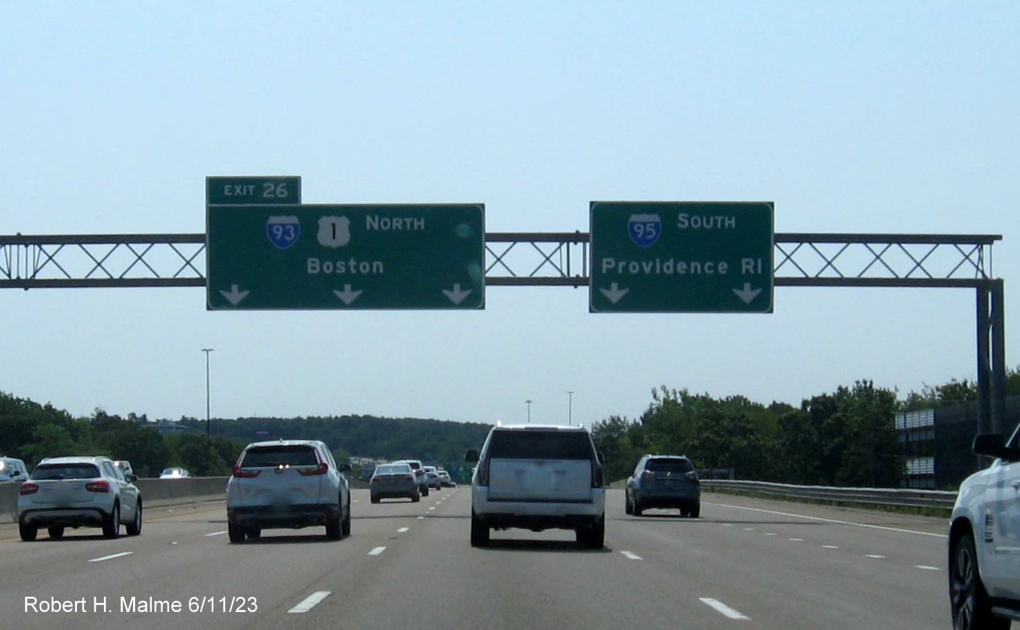 Image of 1/4 Mile advance overhead sign for I-93/US 1 North exit with yellow Left Exit tab removed on I-95/US 1 North in Canton, June 2023