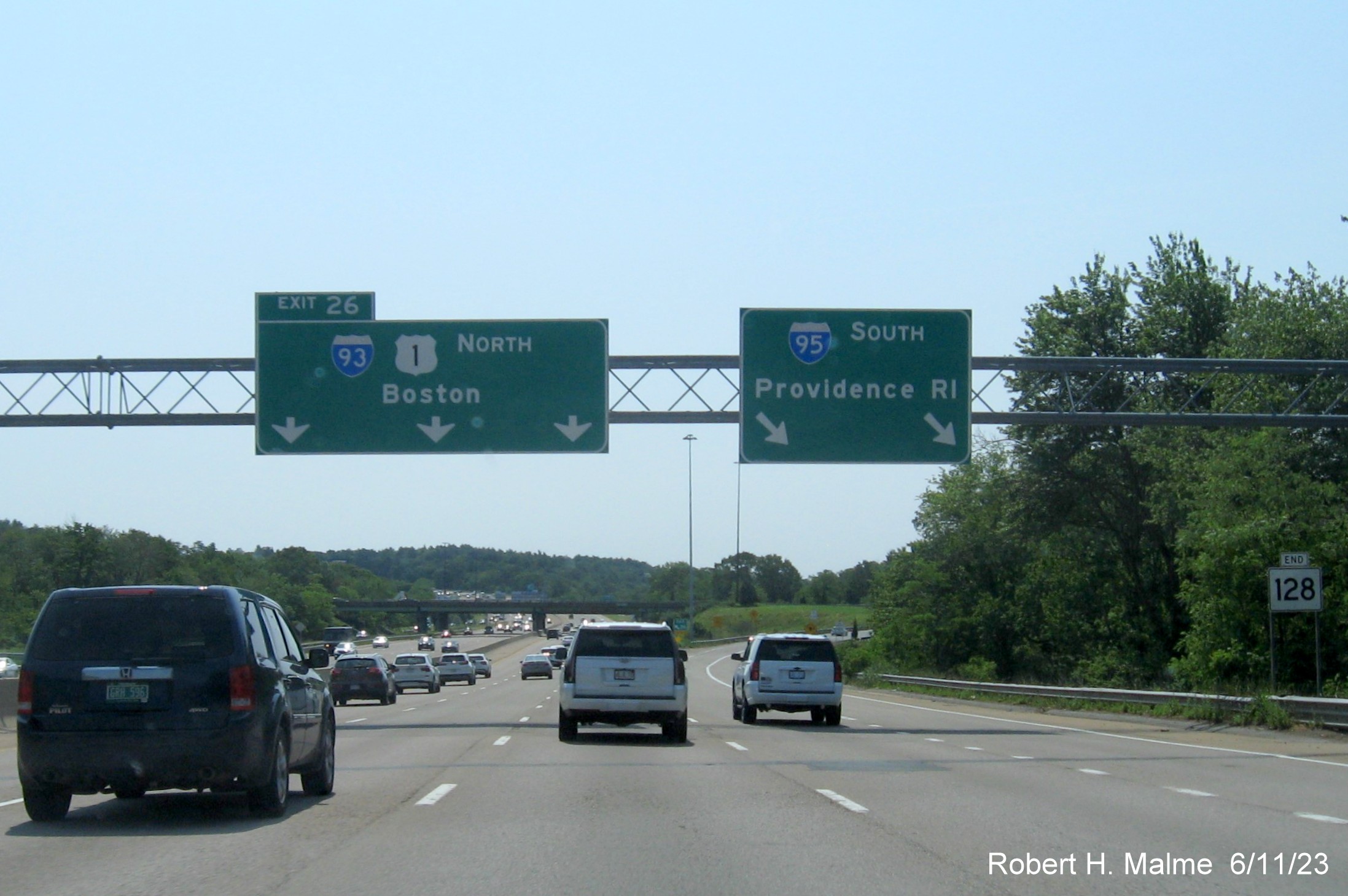 Image of overhead ramp sign for I-93/US 1 exit with yellow Left Exit tab removed on I-95 South/US 1 North in Canton, June 2023
