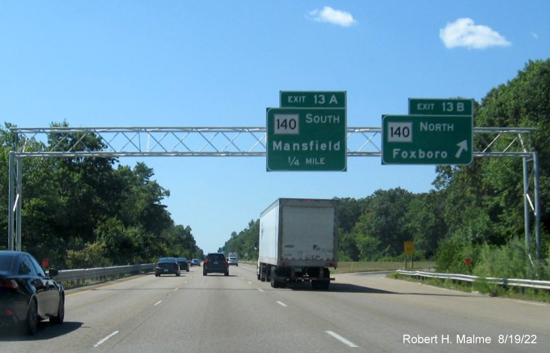 Partial image of newly placed 1 mile advance overhead sign for MA 140 exits on I-95 South in Foxboro, August 2022