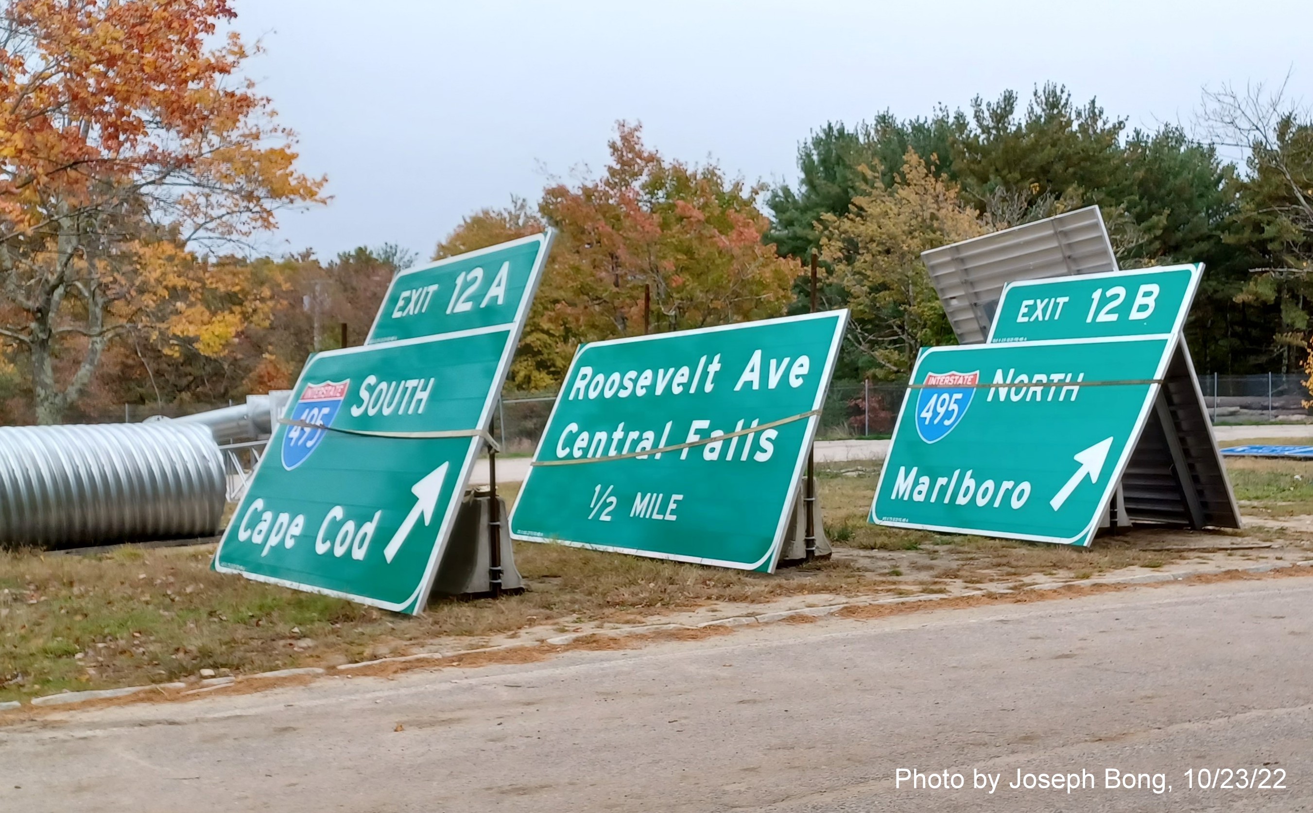Image of yet to be placed overhead signs for I-95 sign replacement project being stored at Mansfield Rest Area on I-95 North, by Joseph Bong, October 2022