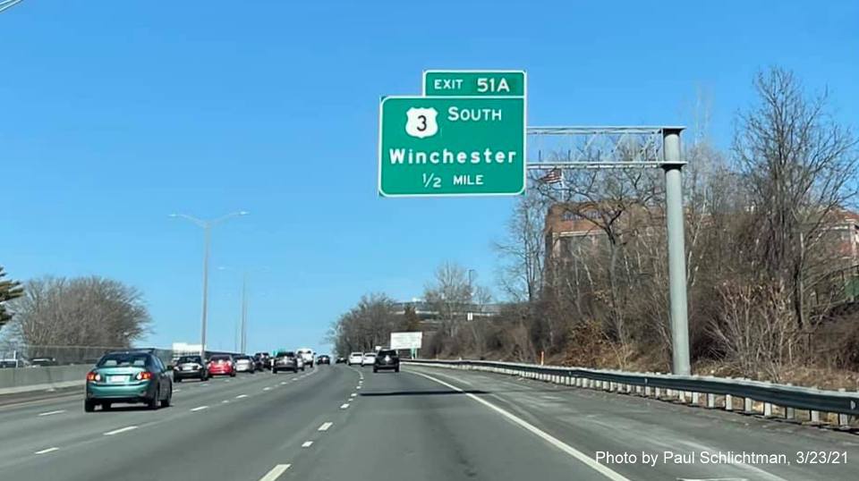 Image of 1/2 mile advance overhead sign for US 3 South exit with new milepost based exit numbers on I-95/MA 128 North in Burlington, by Paul Schlichtman, March 2021