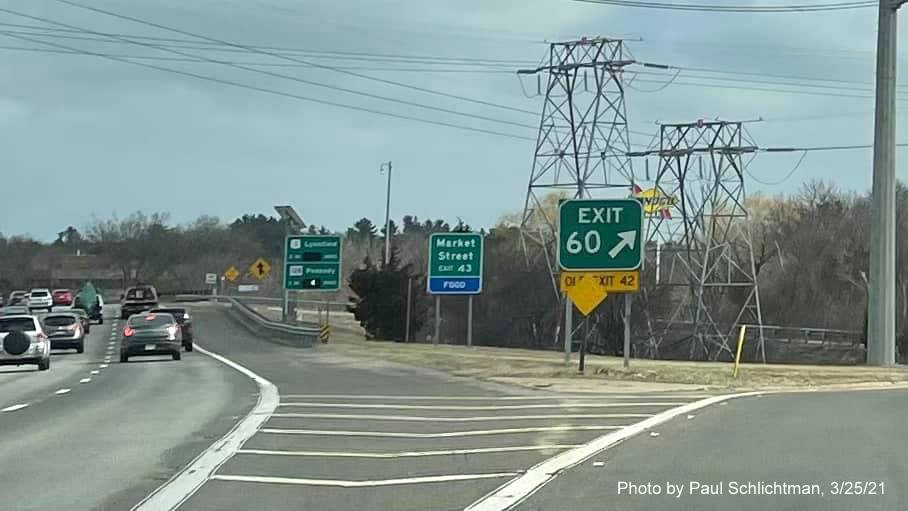 Image of gore sign at ramp for Salem Street exit with new milepost based exit number and yellow advisory Old Exit 42 sign below on I-95/MA 128 North in Wakefield, by Paul Schlichtman, March 2021