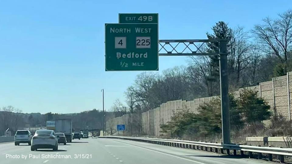 Image of 1/2 Mile advance overhead sign for MA 4 North/MA 225 West exit with new milepost based exit number on I-95/MA 128 South in Burlington, photo by Paul Schlictman, March 2021