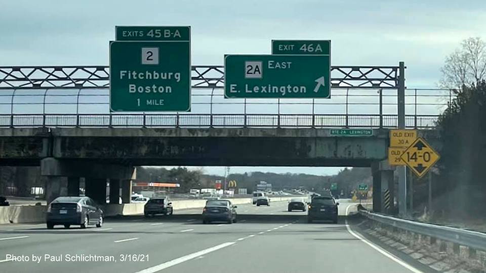 Image of overhead signage at ramp for MA 2A East exit with new milepost based exit number on I-95/MA 128 South in Lexington, photo by Paul Schlictman, March 2021