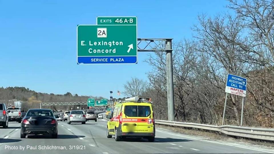 Image of overhead ramp sign for MA 2A exits with new milepost based exit number on I-95/MA 128 North in Waltham, by Paul Schlichtman, March 2021