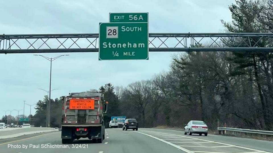 Image of 1/4 Mile advance overhead sign for MA 28 South exit with new milepost based exit number on I-95/MA 128 North in Reading, by Paul Schlichtman, March 2021