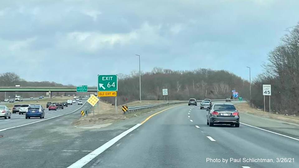 Image of gore sign for MA 128 North exit with new milepost based exit number on I-95 North in Peabody, March 2021