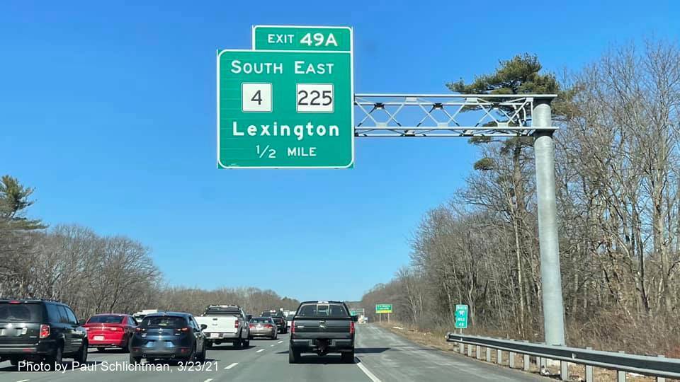 Image of 1/2 mile advance overhead sign for MA 4 South/MA 225 East exit with new milepost based exit number on I-95/MA 128 North in Lexington, by Paul Schlichtman, March 2021