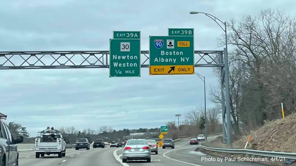 Image of overhead signage at ramp for I-90 exit with new milepost based exit numbers on I-95/MA 128 South in Weston, by Paul Schlichtman, April 2021