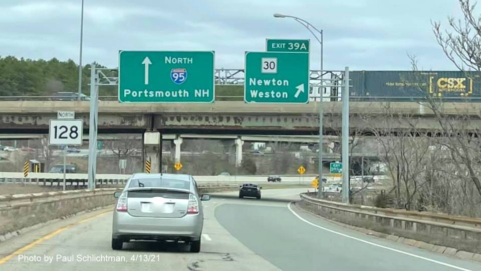 Image of overhead ramp sign for MA 30 exit with new milepost based exit number on ramp from I-95/128 North in Newton, by Paul Schlichtman, April 2021