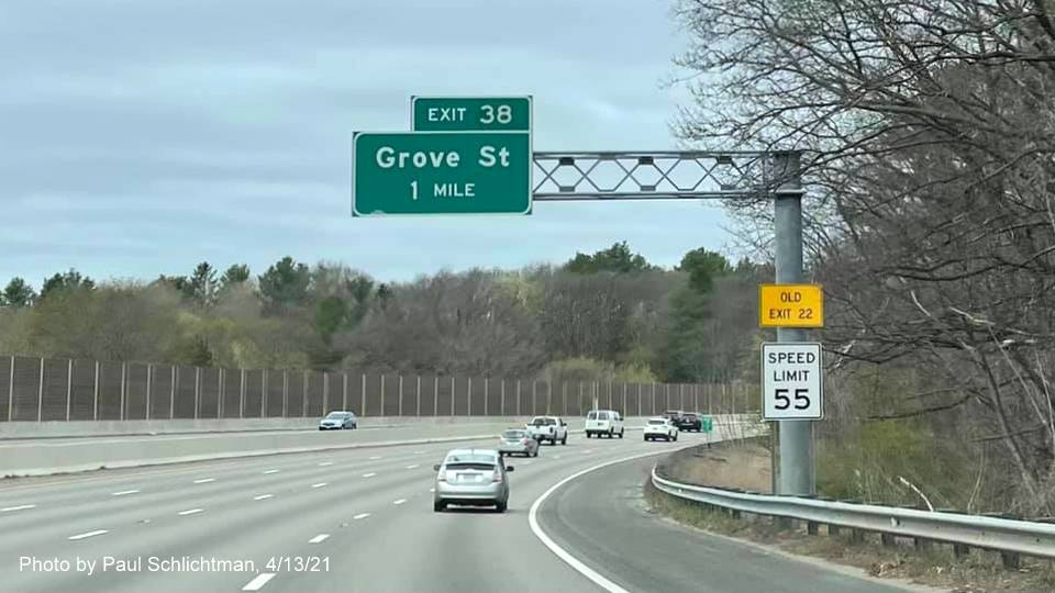 Image of 1 mile advance overhead sign for Grove Street exit with new milepost based exit number and yellow Old Exit 22 sign on support on I-95/128 North in Newton, by Paul Schlichtman, April 2021