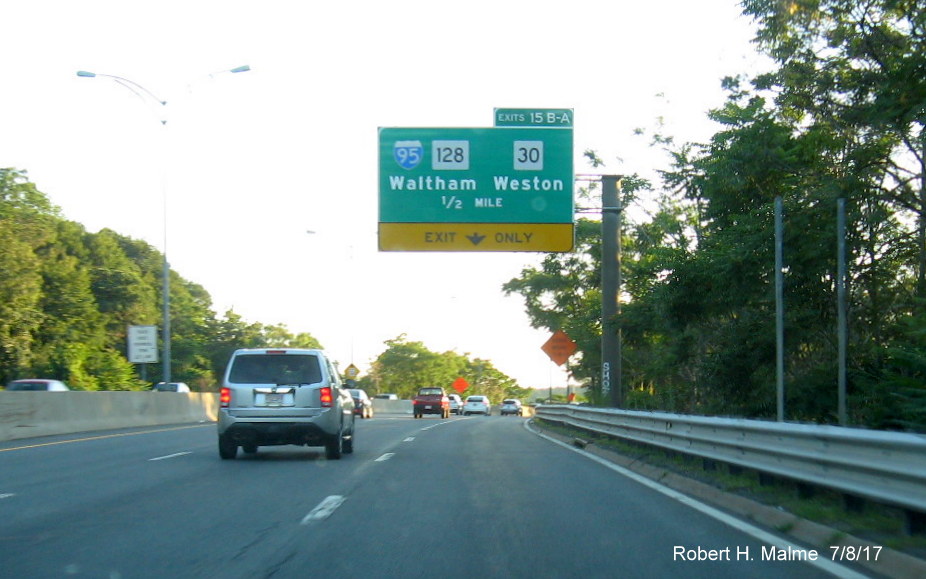 Image of new exit tab on existing sign for I-95/MA 30 exits on I-90 West in Newton