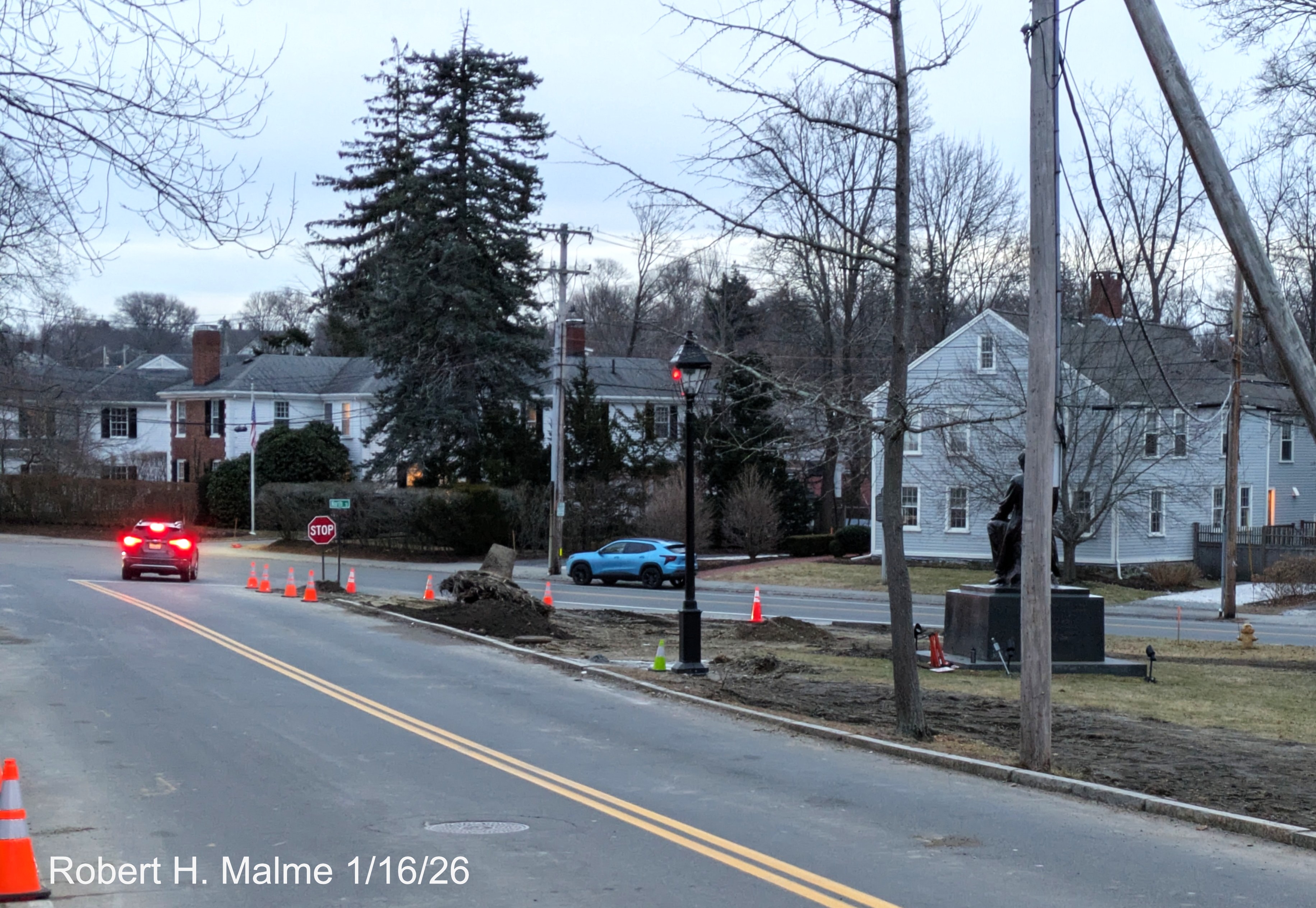 Image of stump of cut down tree at corner of Lincoln and North Streets from North
	Street, January 2026
