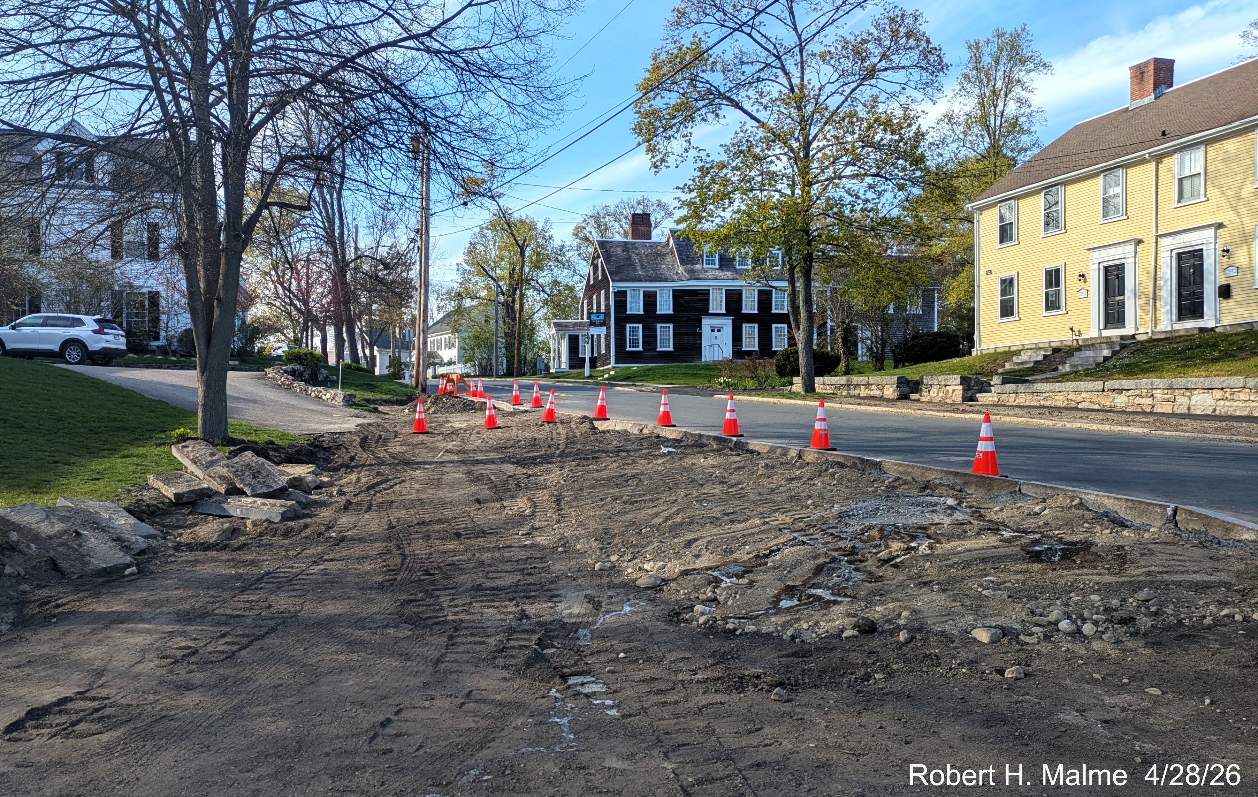Image from former western leg of Lincoln Street showing progress in removing pavement,
	April 2026
