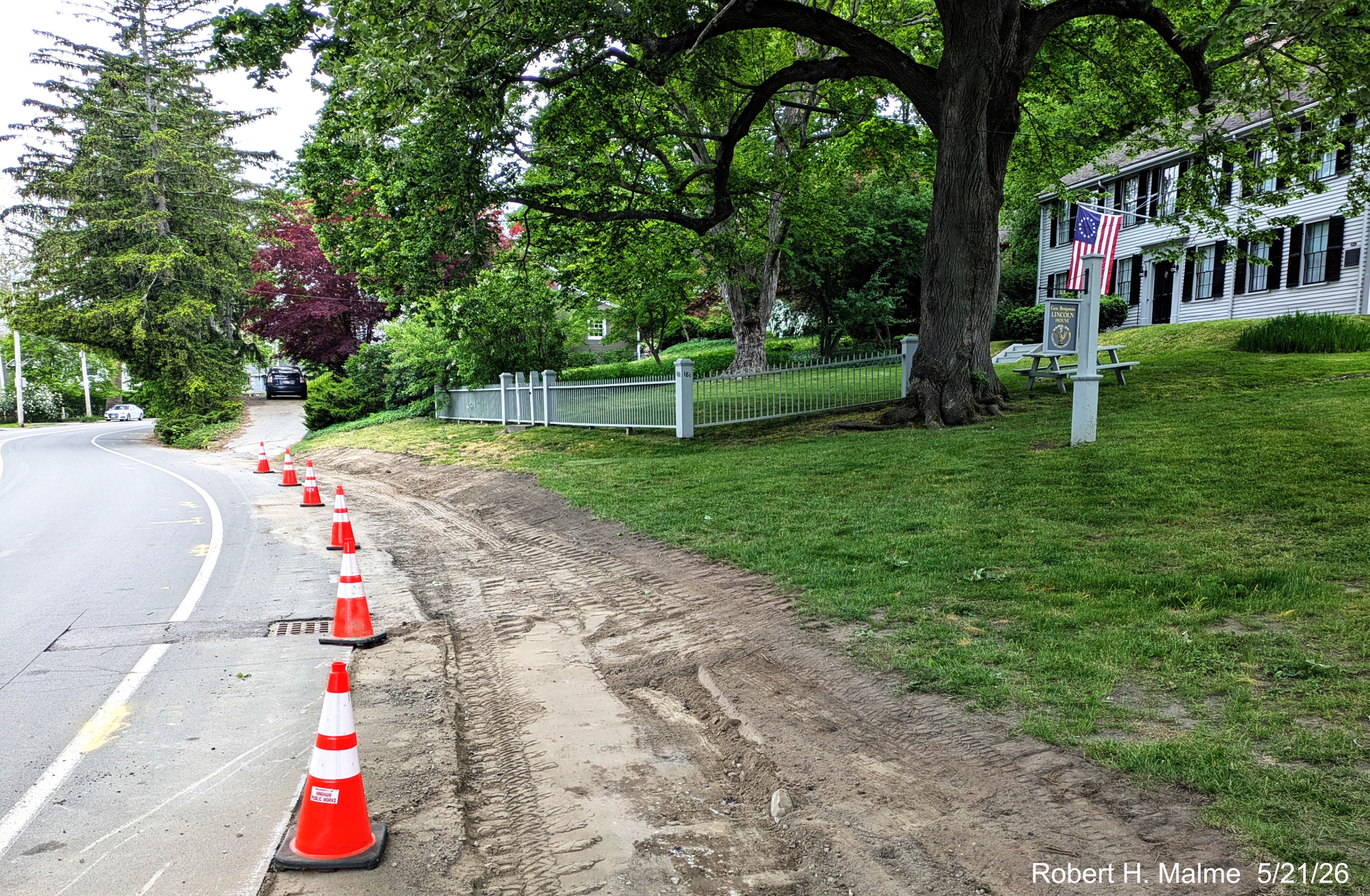 Image looking west along North Street showing near widening a section of the road in
	front of the Benjamin Lincoln House to add parking spaces, May 2026
