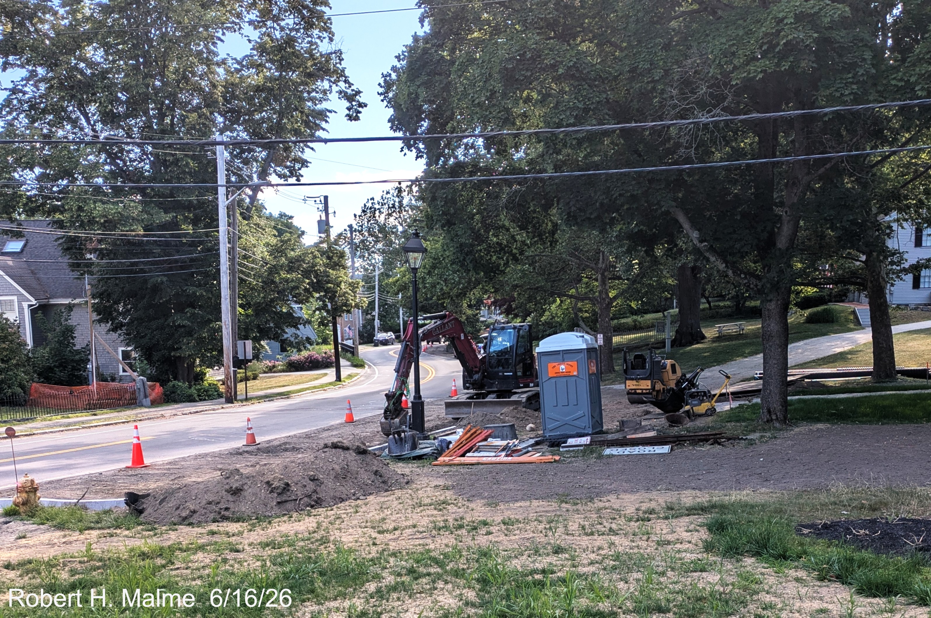 Image taken of North Street, showing curbing work on the Fountain Square side while
	landscaping work continues, June 2026