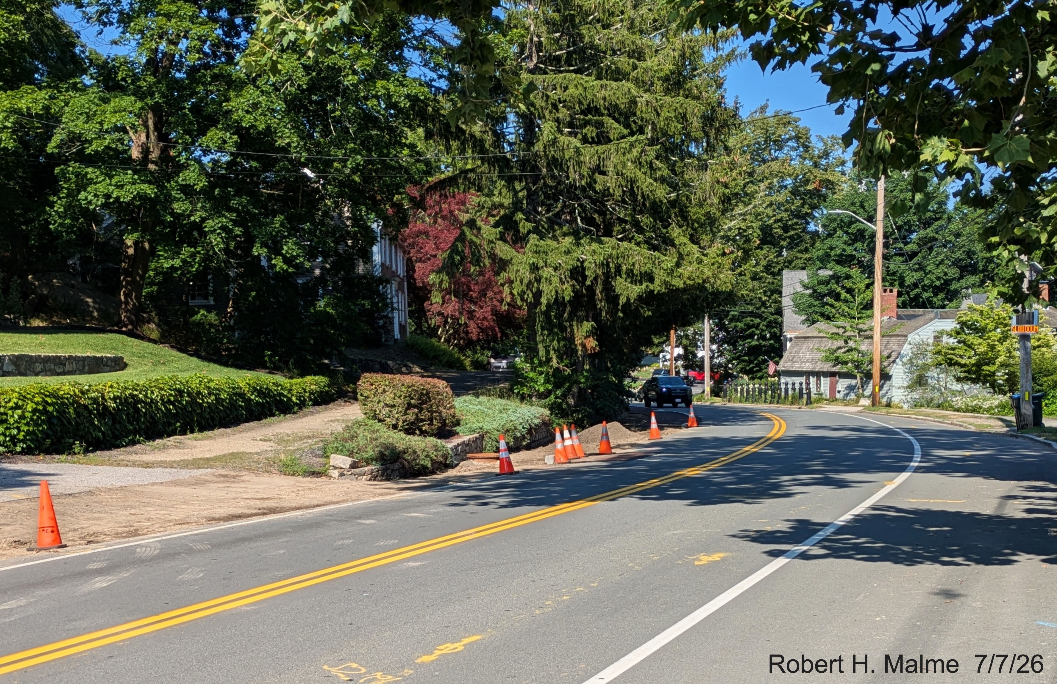Image taken looking east along North Street at the end of sidewalk construction along
	North Street, July 2026