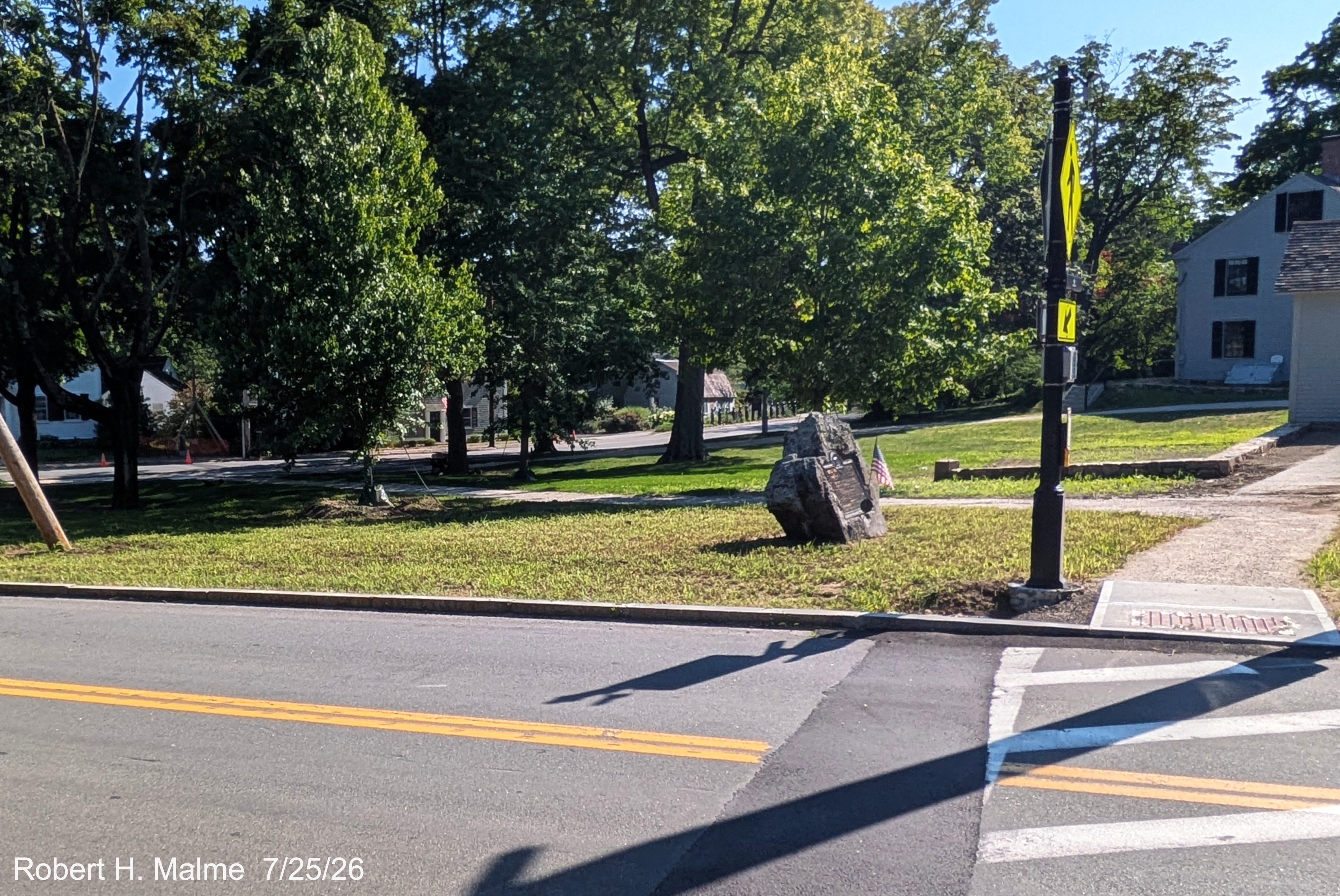 Image taken looking west across Lincoln Street at the pedestrian crossing showing near 
	completion of the work at the northern end of the project, July 2026