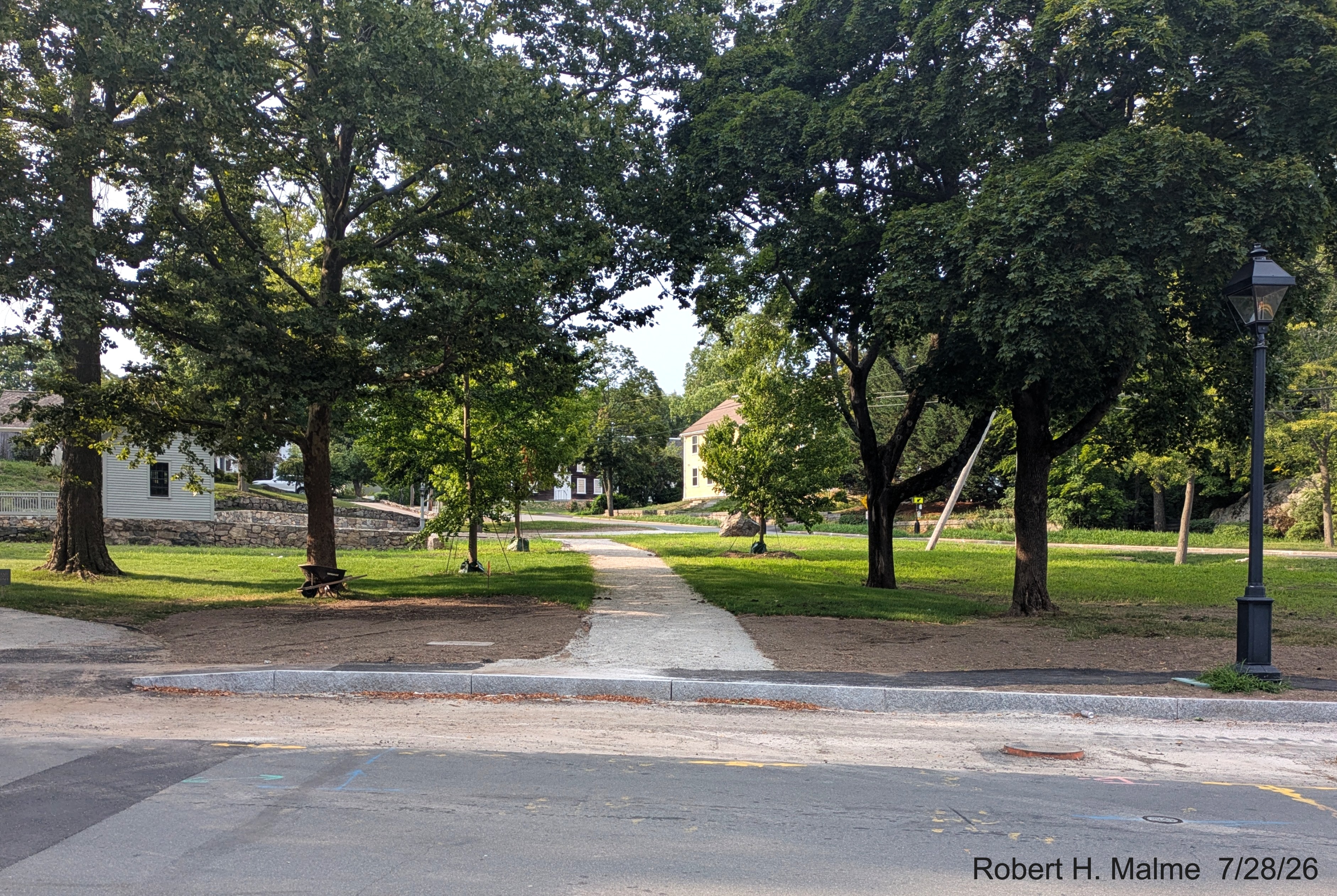 Image taken of completed work on new pathway through Fountain Square as seen from North 
	Street, July 2026