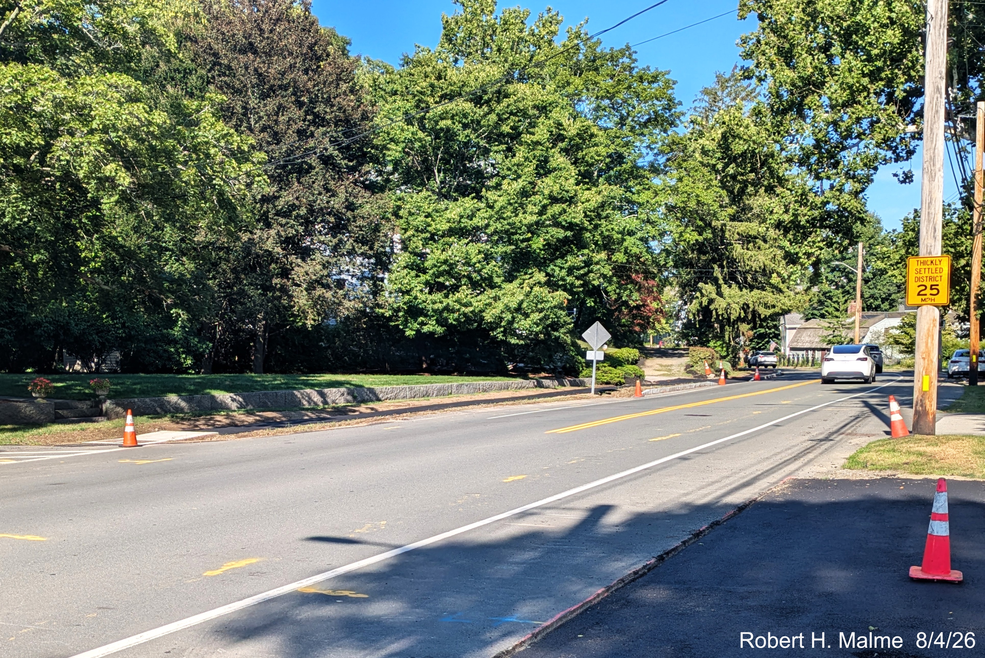 Image taken looking at pavement placed along new parking spaces on North Street near the
	Benjamin Lincoln House, August 2026