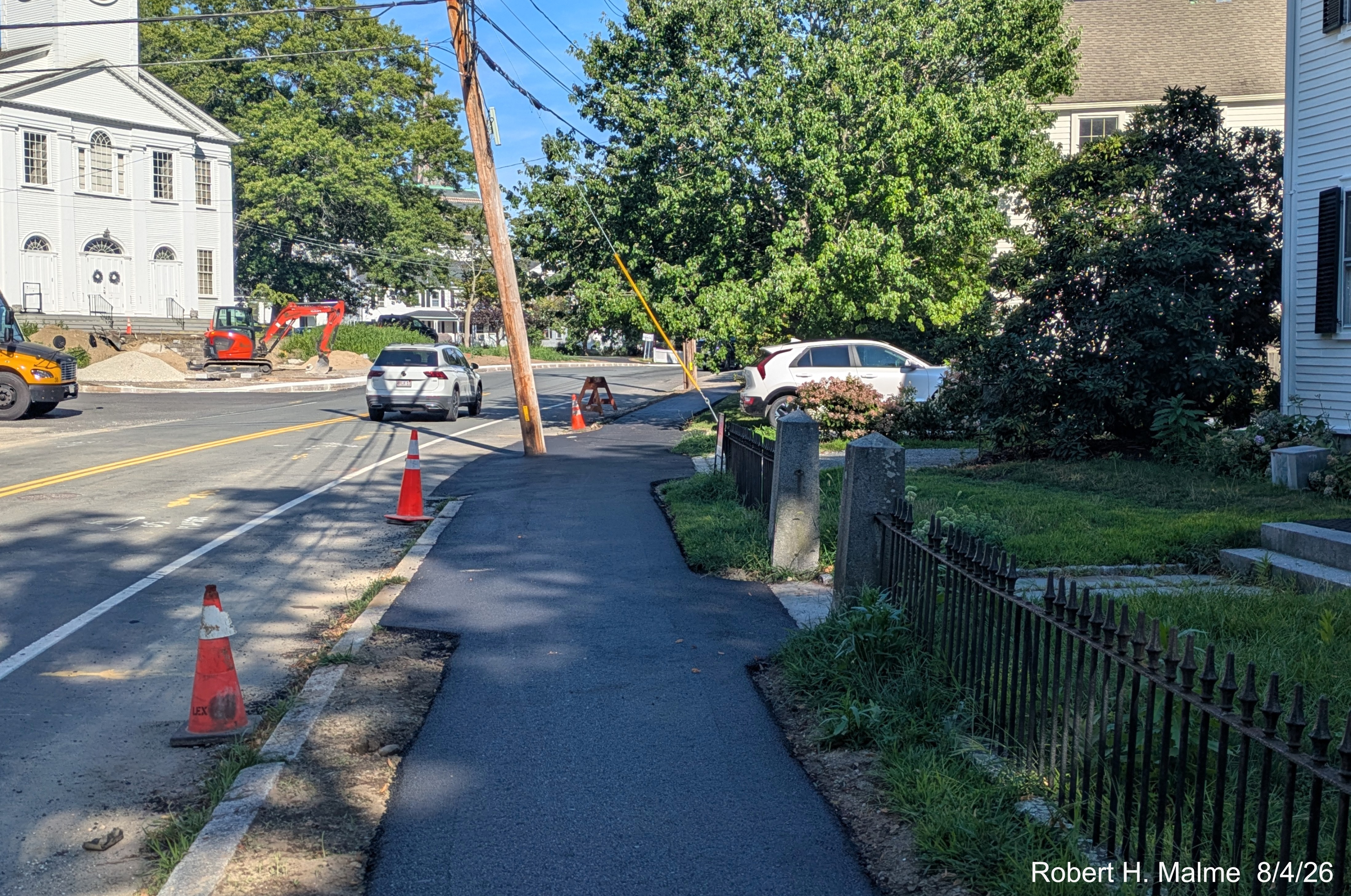 Image taken looking at pavement placed along existing sidewalk on North Street in front
	of the Samuel Lincoln House, August 2026