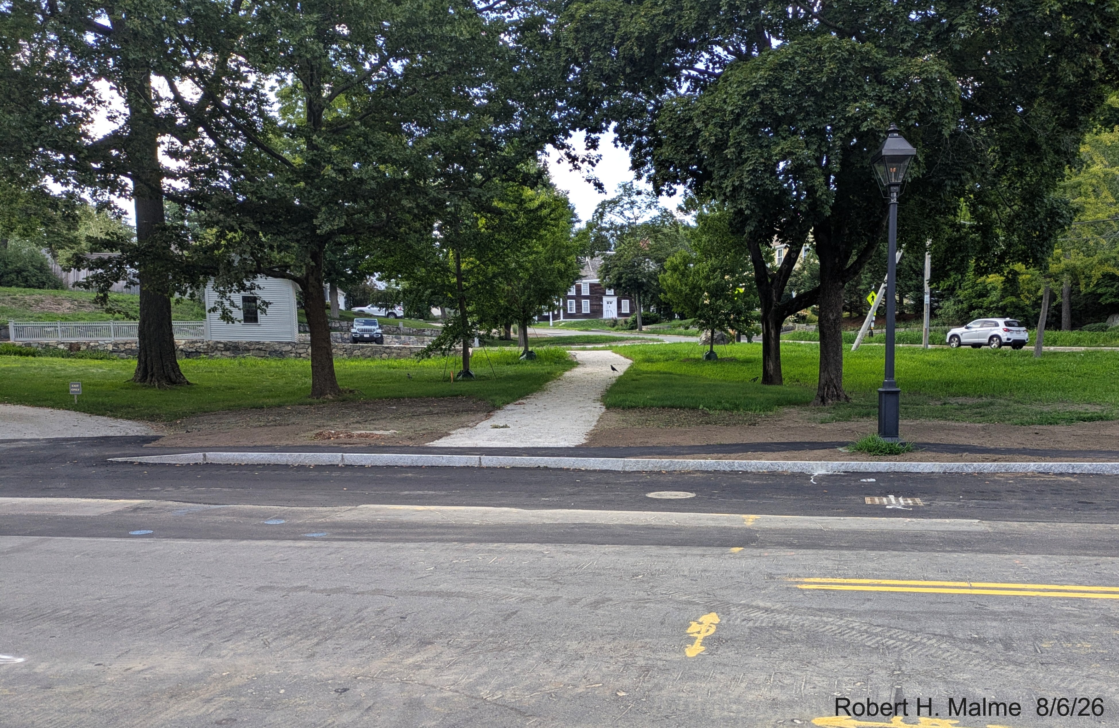 Image taken looking at pavement placed along existing sidewalk on North Street in front
	of the Samuel Lincoln House, August 2026