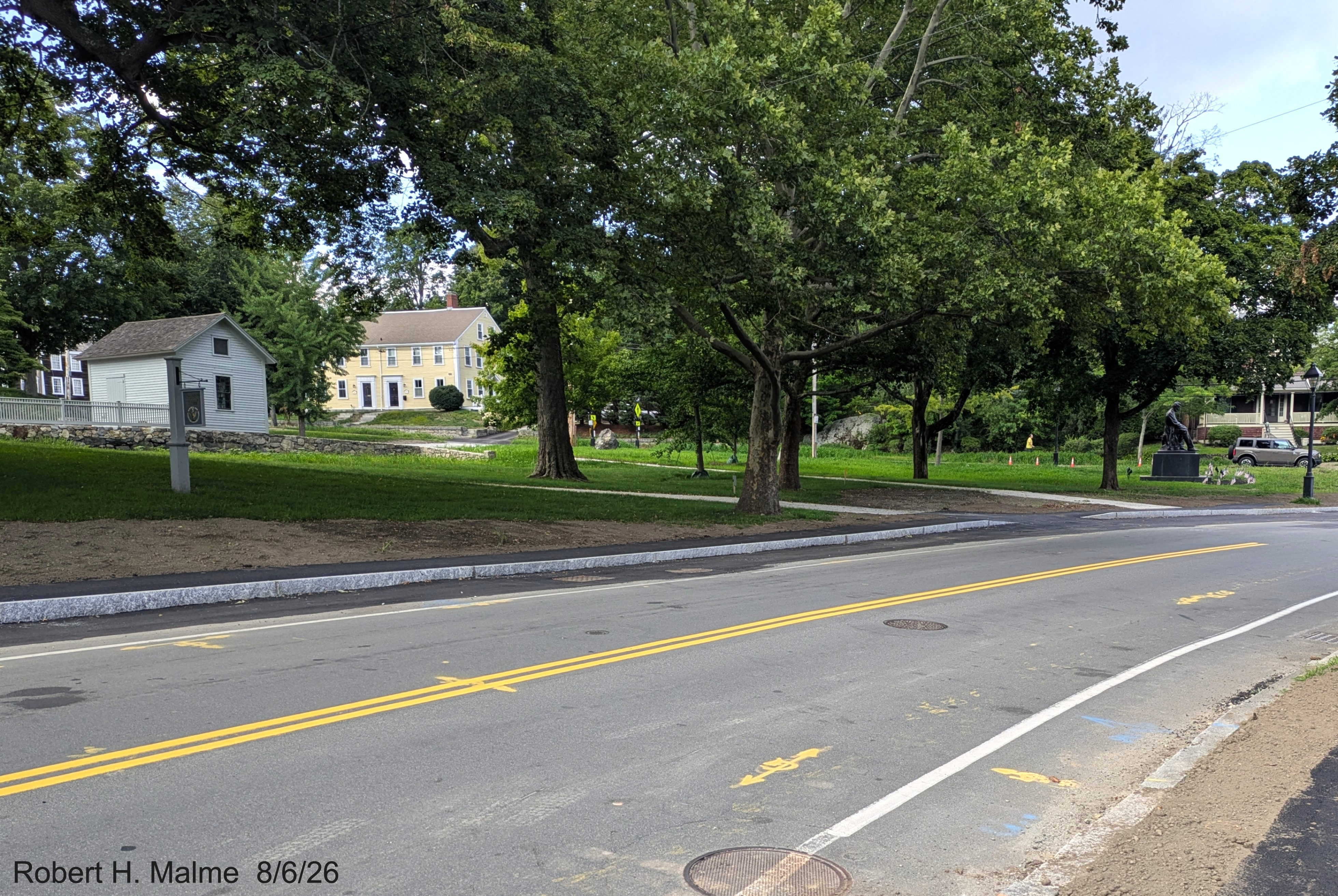 Image taken looking at pavement placed in new parking spaces along North Street in front
	of the Benjamin Lincoln House, August 2026