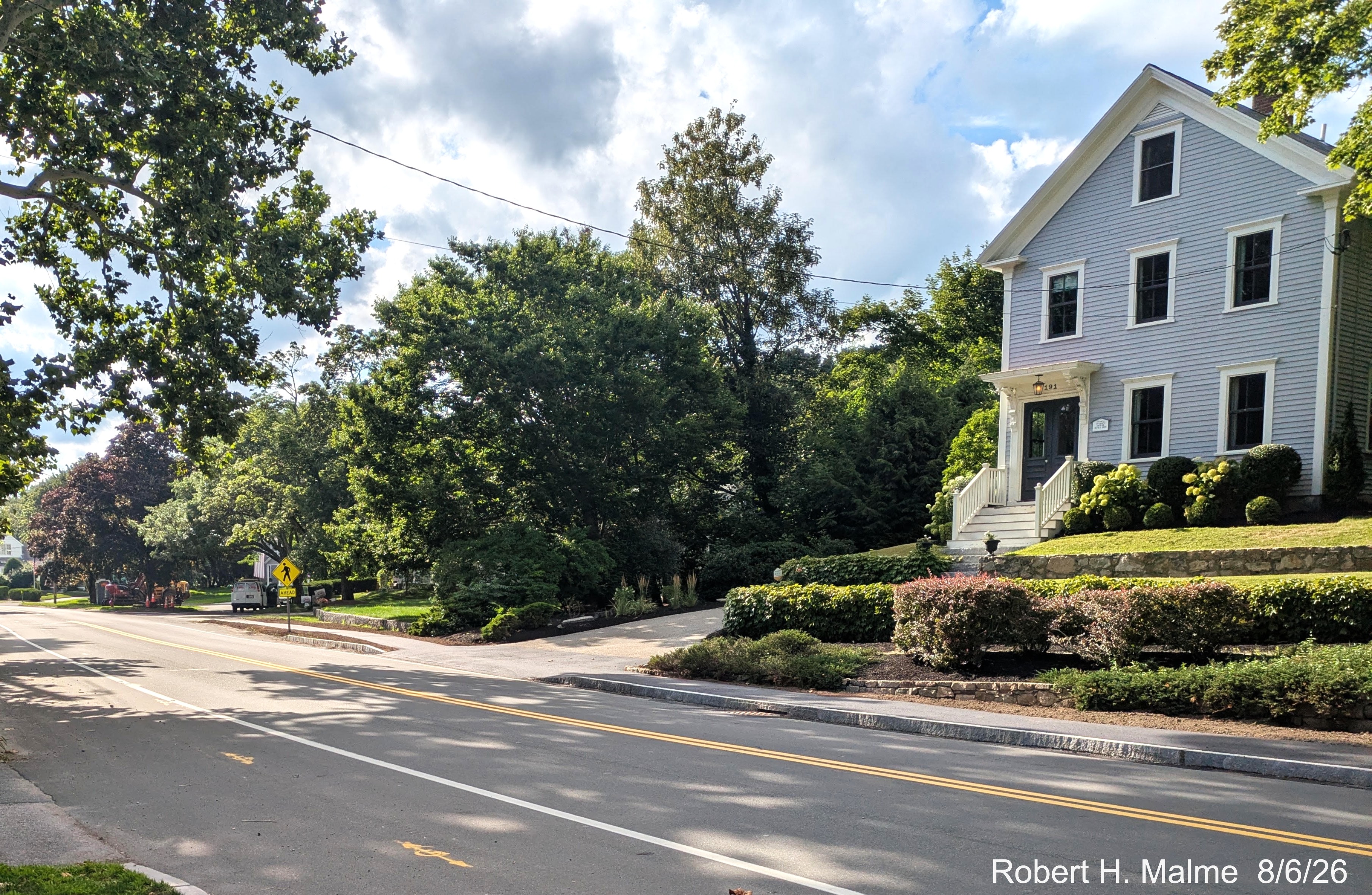 Image taken looking at paved new sidewalk along North Street heading west away from the
	Benjamin Lincoln House, August 2026