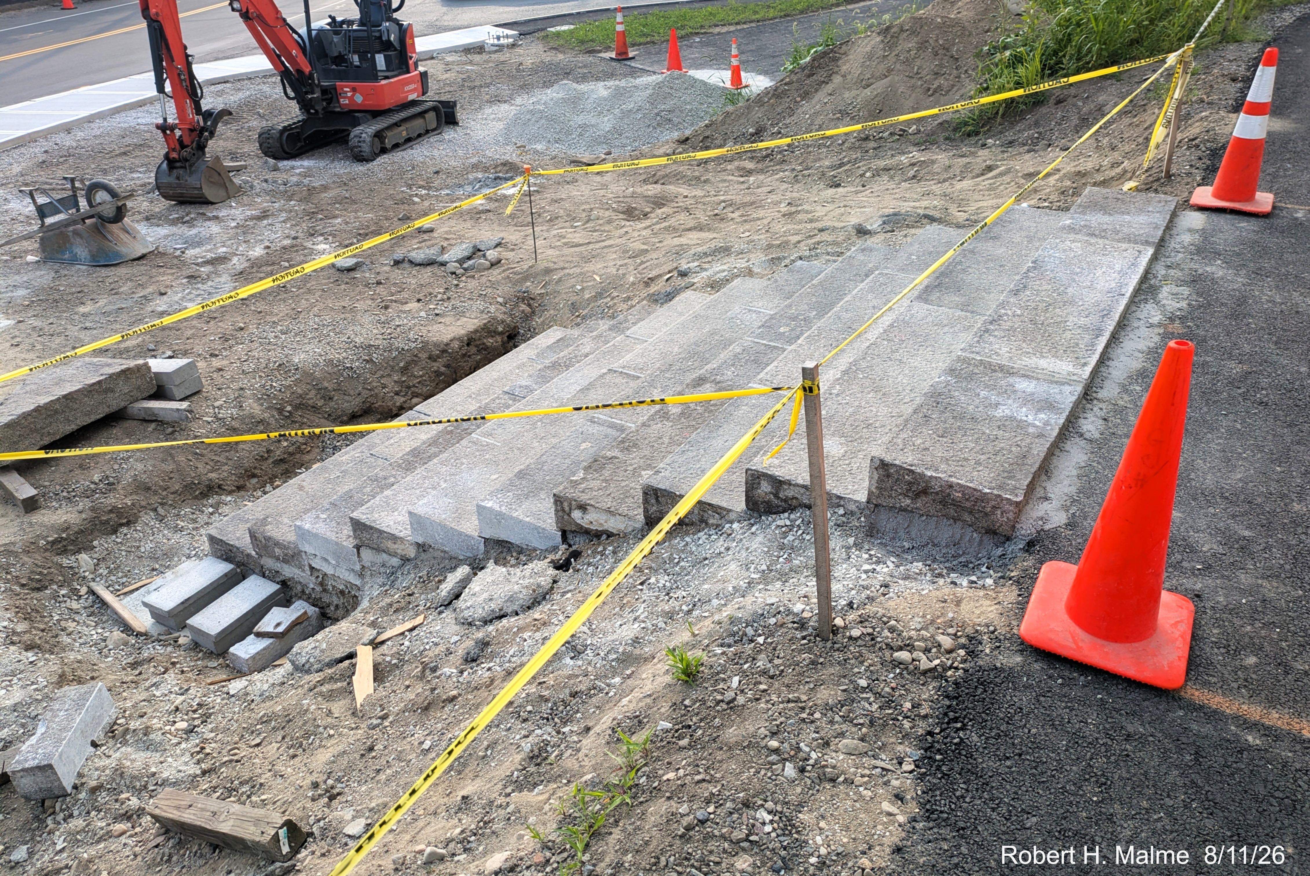 Image taken looking at nearly completed stone steps in front of the New North Church
	looking towards Lincoln Street, August 2026