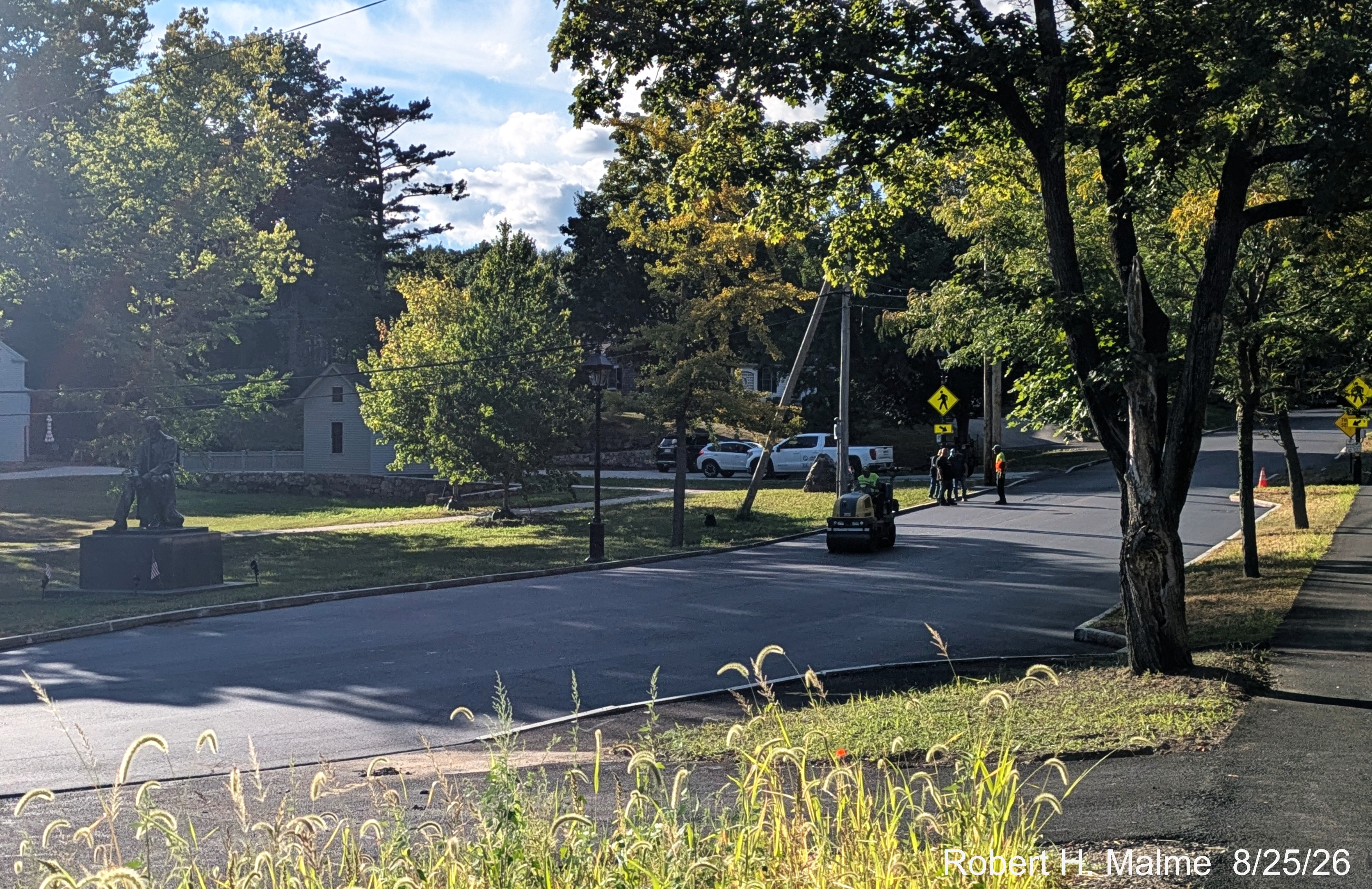 Image taken looking up Lincoln Street from in front of the New North Church after the final
	paving of the roadway on August 25, August 2026