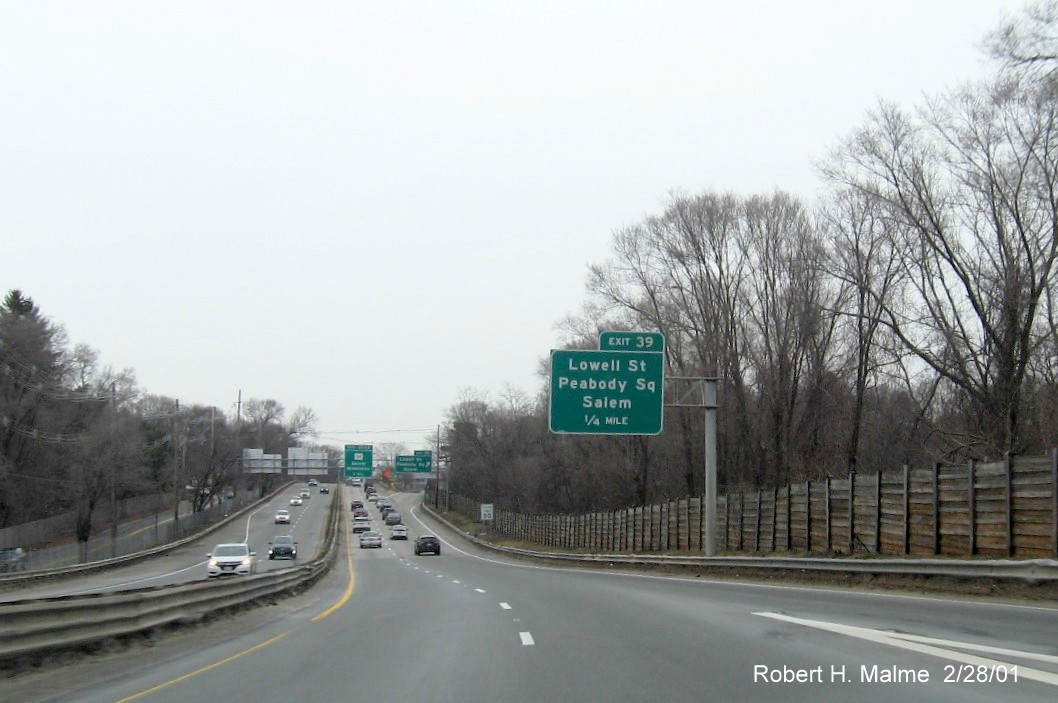 Image of 1/4 mile advance sign for Lowell Street exit with new milepost based exit number on MA 128 North in Peabody, February 2021