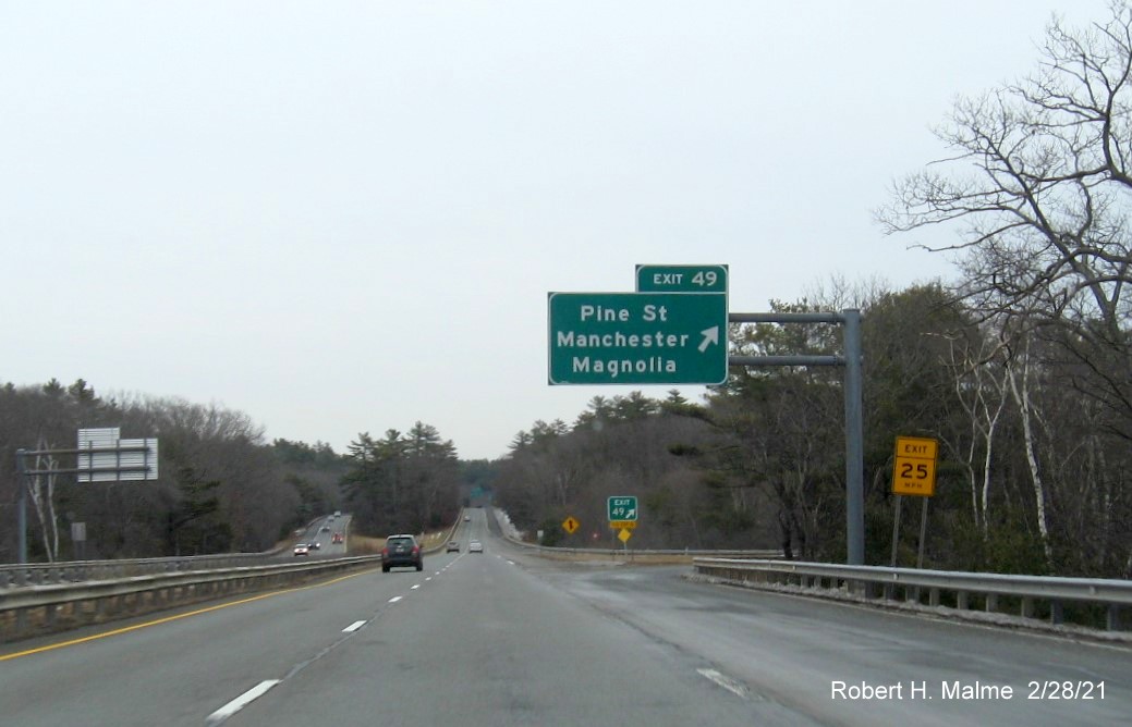 Image of overhead ramp sign for Pine Street exit with new milepost based exit number on MA 128 North in Manchester-by-the-Sea, February 2021