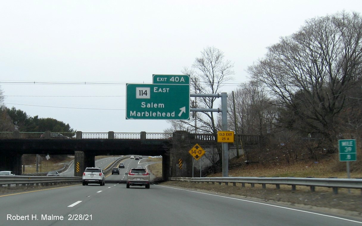 Image of overhead ramp sign for MA 114 East exit with new milepost based exit number on MA 128 South in Peabody, February 2021