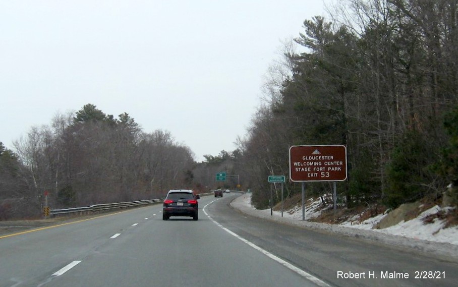 Image of brown cultural site sign for MA 133 exit with new milepost based exit number on MA 128 North in Essex, February 2021